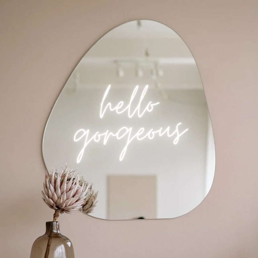 glowU Med Spa interior with 'hello gorgeous' mirror